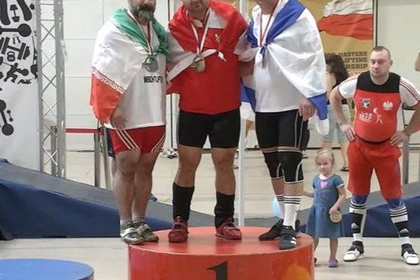Iranian Weightlifter Banned For Life Over Controversial Photo