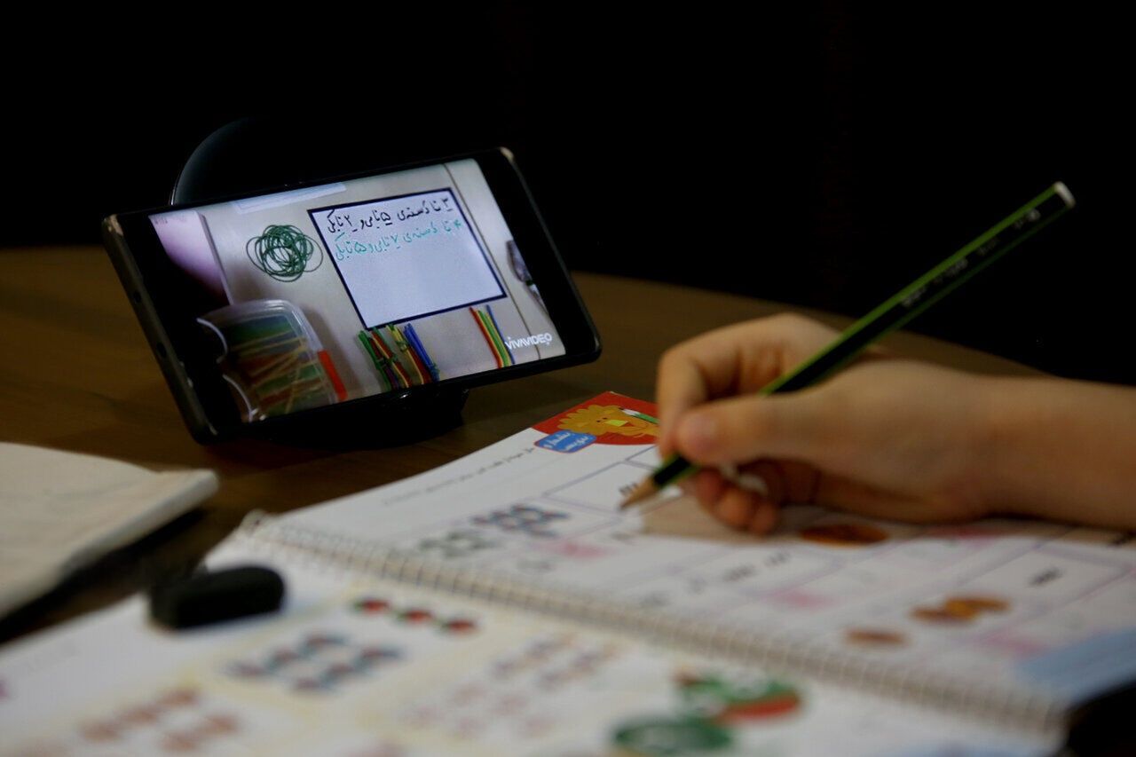A student attends an online class through Iran’s government-backed Shad platform after schools shifted to remote learning during wartime closures.