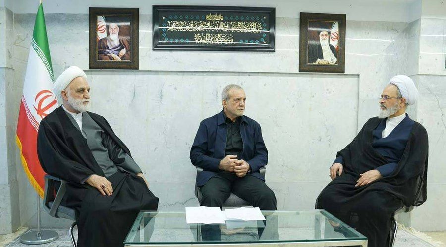 Members of Iran’s leadership council meet at an undisclosed location on March 1 with social media users saying the low ceiling and iron door behind them suggest the meeting was held inside Tehran’s Arman Hospital.