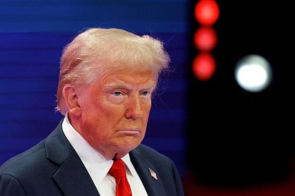 Trump suggests he would not seek Iran regime change