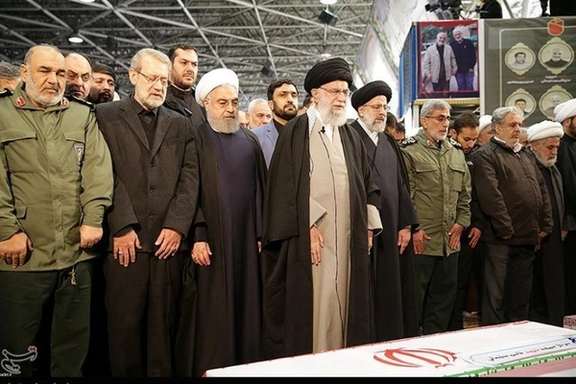 Iran's top leaders paying respects to Qasem Soleimani's coffin in January 2020