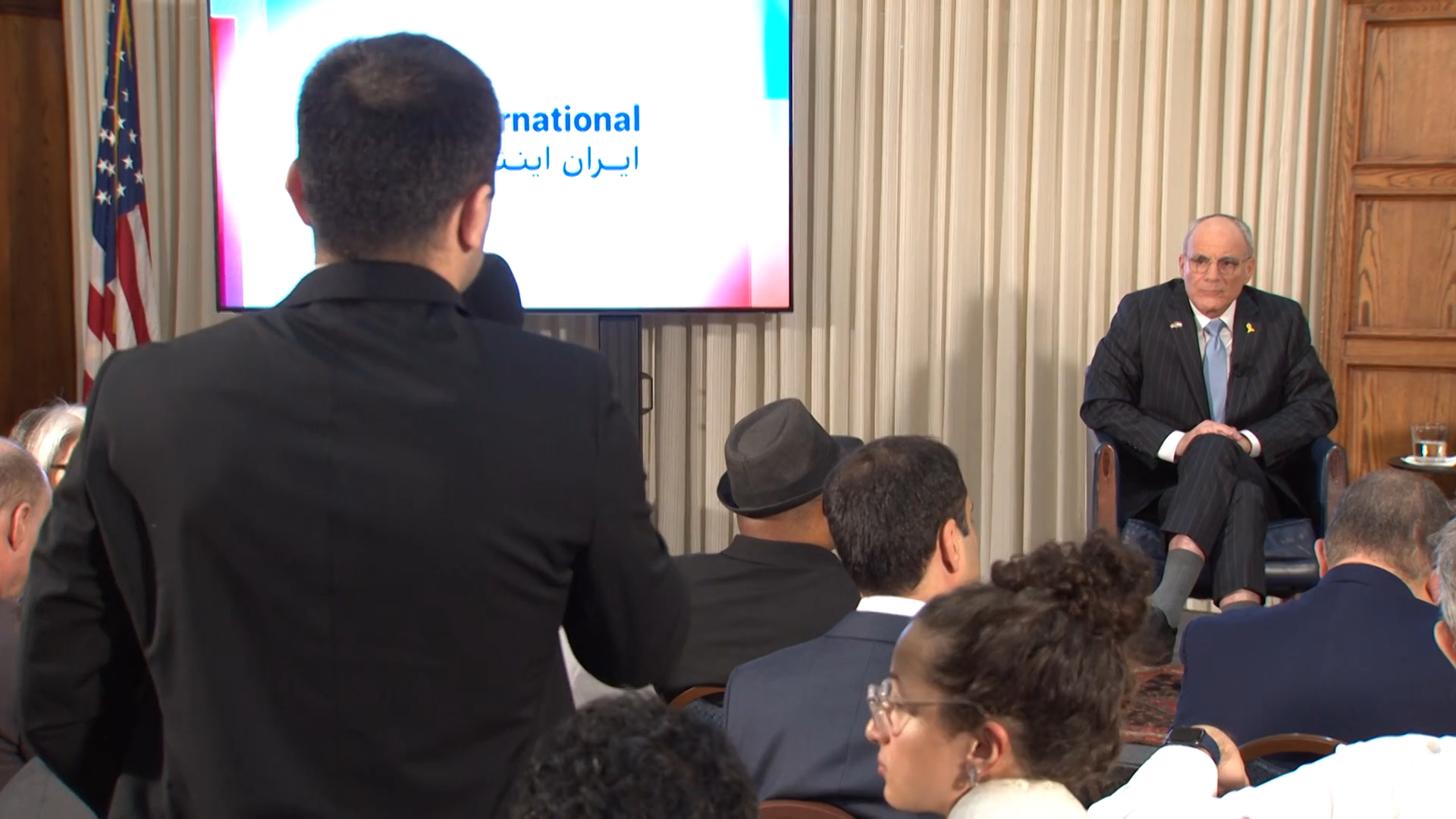 An audience member asks the Israeli ambassador a question during the townhall held on June 24, 2025.