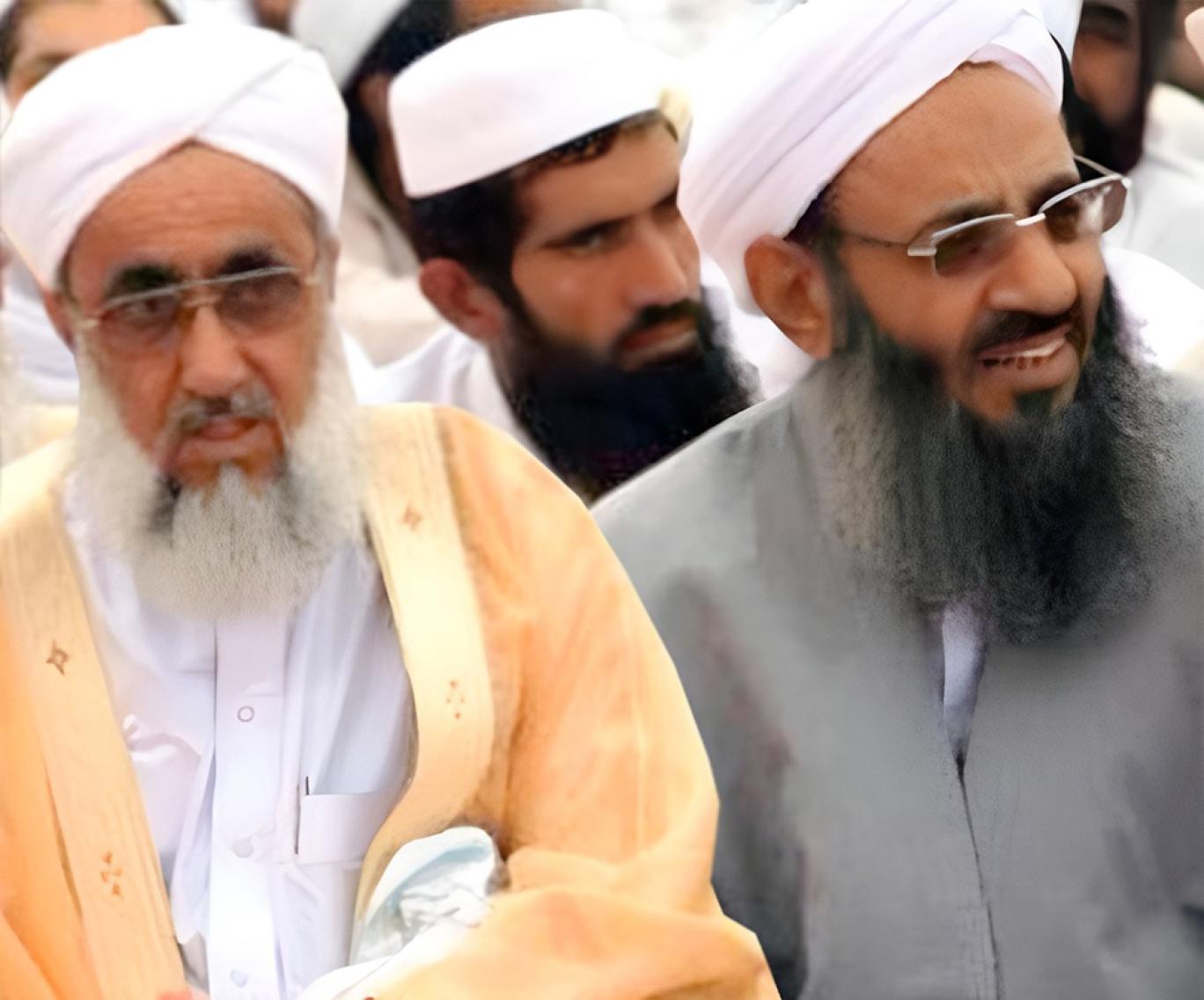 Mowlavi Fat’hi-Mohammad Naghshbandi, the Friday prayer leader of the city of Rask (left) and Iran’s top Sunni cleric Mowlavi Abdolhamid 