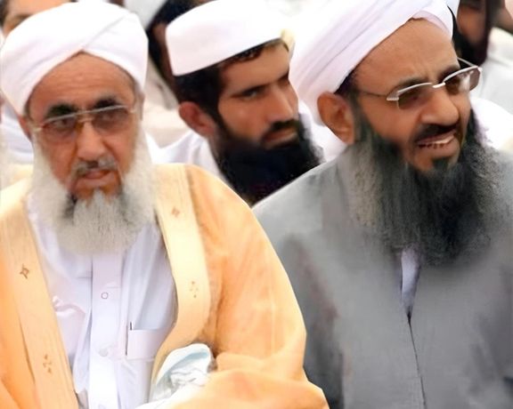 Mowlavi Fat’hi-Mohammad Naghshbandi, the Friday prayer leader of the city of Rask (left) and Iran’s top Sunni cleric Mowlavi Abdolhamid