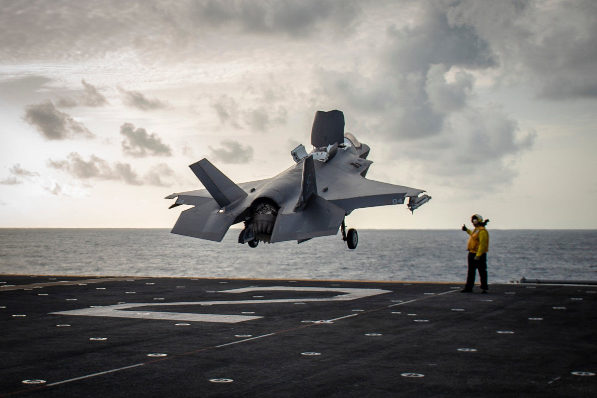 An F-35B Lightning II, attached to the Wake Island Avengers of Marine Fighter Attack Squadron (VMFA) 211, launches from the flight deck of Wasp-class amphibious assault ship USS Essex (LHD-2) on August 30, 2018. 