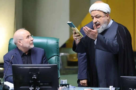 Iran's Parliament Speaker Mohammad Bagher Ghalibaf (left) and hardline lawmaker Hamid Rasaei