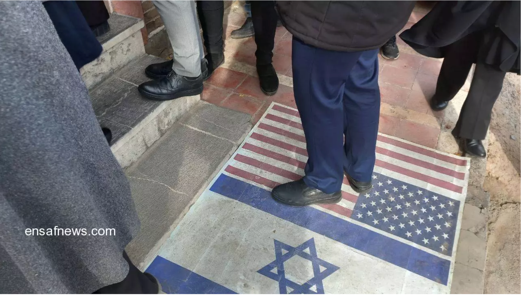 US and Israeli flags painted on the ground at the presidential office now removed according to Ensaf News