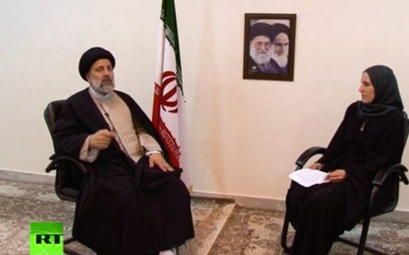 Catherine Perez-Shakdam, a French woman of Jewish heritage, interviews future Iranian President Ebrahim Raisi in Mashad in May 2017 (Screenshot: Russia Today)
