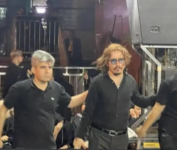 The Johnny Depp lookalike at a religious ceremony in Tehran. August 6, 2022