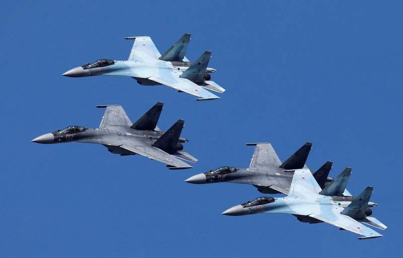 Sukhoi Su-35 jet fighters of the "Sokoly Rossii" (Falcons of Russia) aerobatic team fly in formation during a rehearsal for the airshow in Krasnoyarsk, Russia August 1, 2019. 