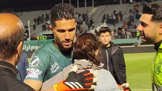 Controversy Erupts As Female Fan Hugs Goalkeeper In Iran