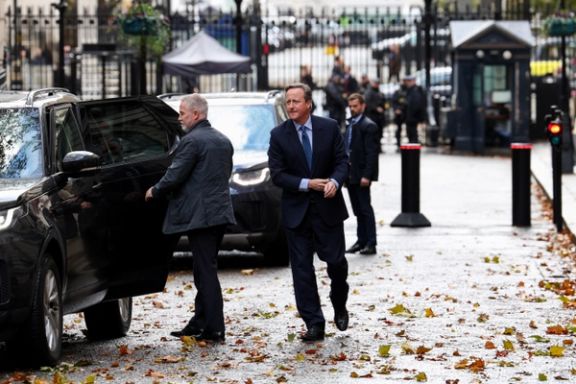Former British Prime Minister David Cameron walks outside 10 Downing Street in London, Britain November 13, 2023.