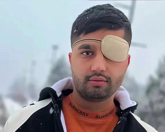 امیر ولایتی، آسیبدیده چشمی، بابت اتهامهایی از جمله «بغی» به دادگاه احضار شد