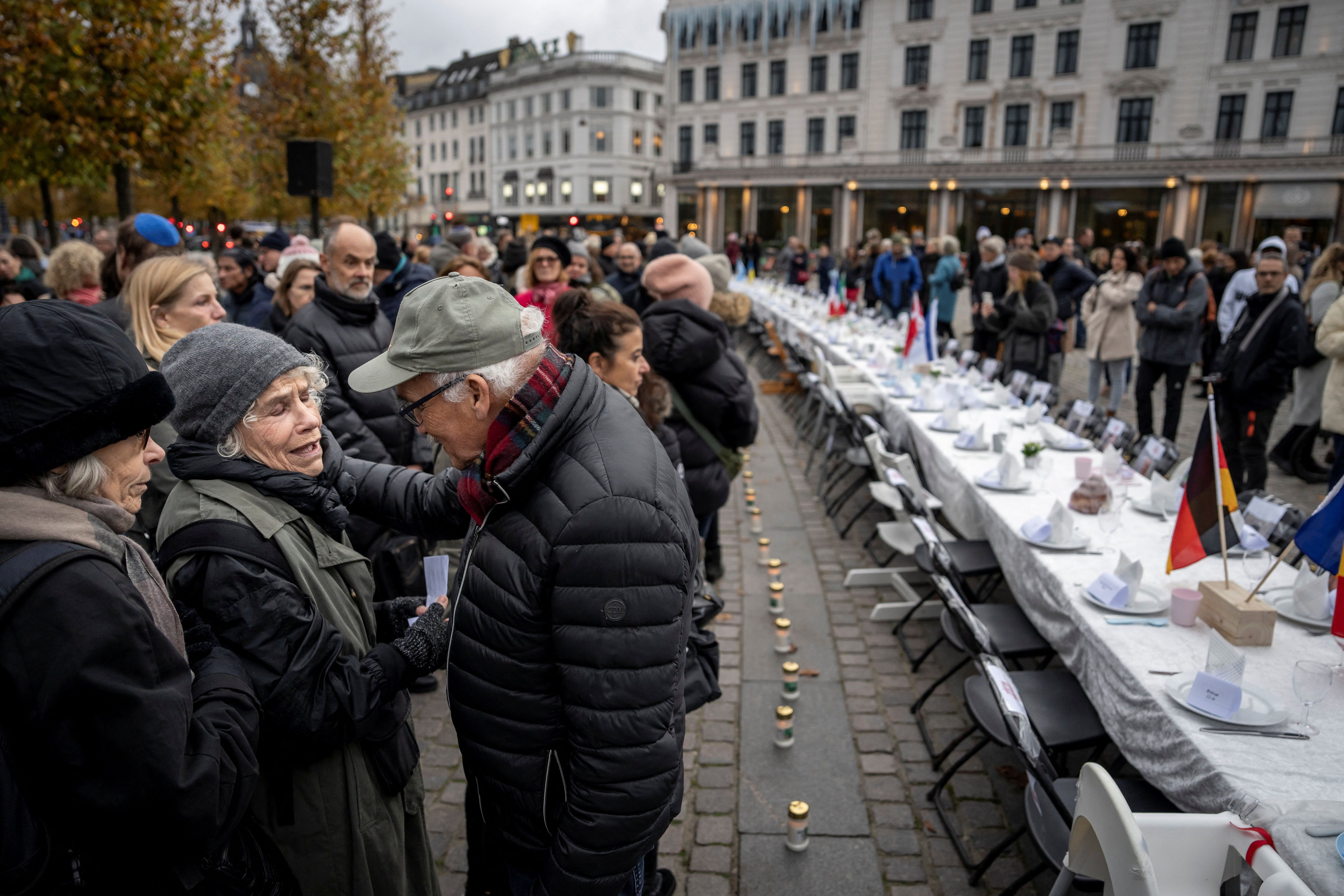 A Shabbat table for more than 200 hostages trapped in Gaza is set up with a place for each of the hostages at Kongens Nytorv in Copenhagen, Denmark, October 27, 2023.