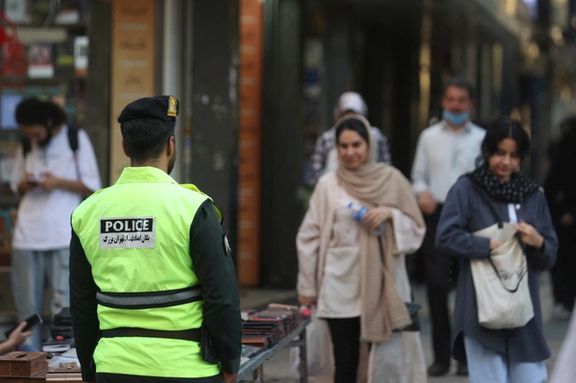 An Iranian police force stands on a street during the revival of morality police in Tehran, Iran, July 16, 2023.