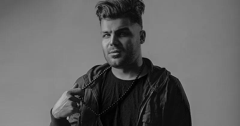 Dissident Iranian rapper sentenced to death arrives in Germany