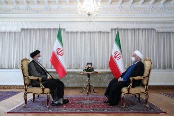 President Ebrahim Raisi (left) and former president Hassan Rouhani
