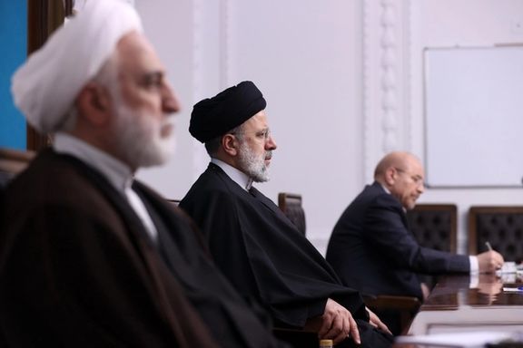 Iran’s President Ebrahim Raisi (center) sitting beside Chief Justice Gholam-Hossein Mohseni-Ejei (left) and Parliament Speaker Mohammad Bagher Ghalibaf during a session on Iran’s economy on December 13, 2023