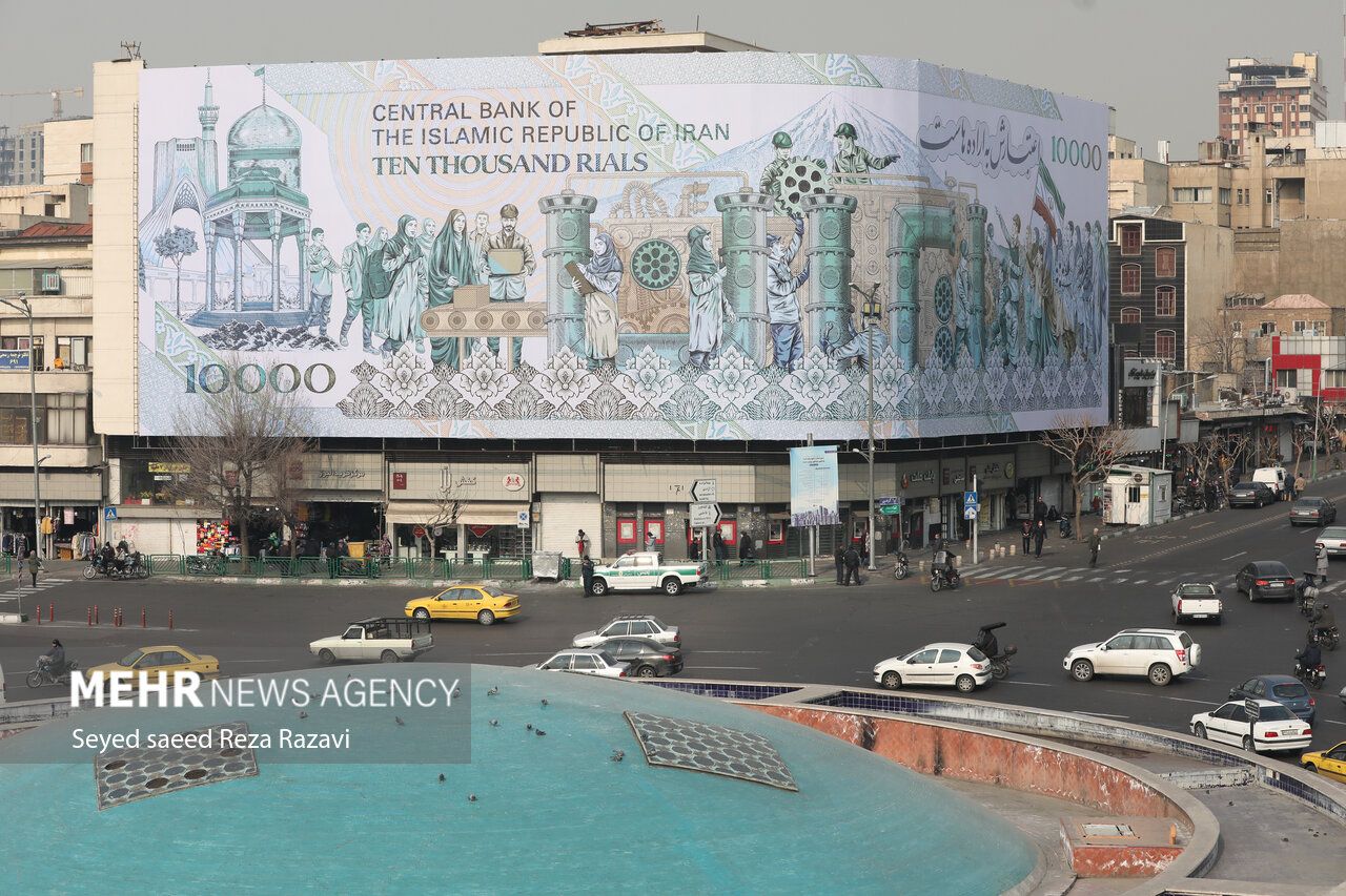File photo of a mural at Tehran’s Enqelab square showing the Iranian 10,000-rial banknote worth less than two cents now  