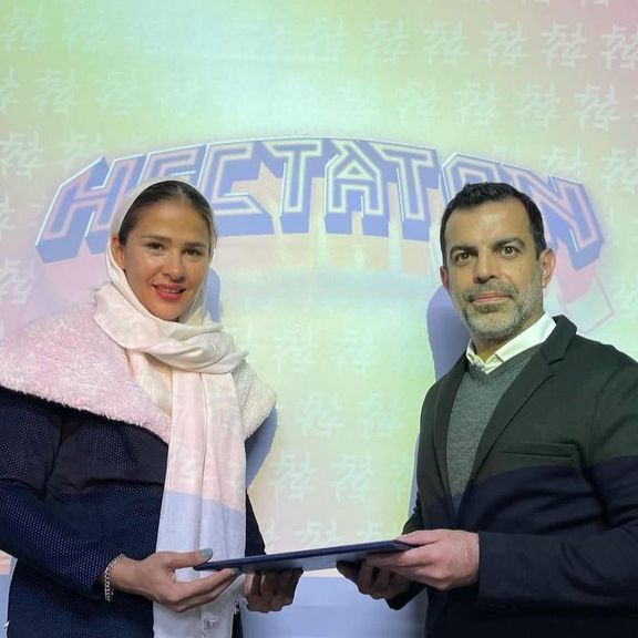 Mahsa Javar (L) and Hectaton brand owner Ali Ajdarkosh (R), who provided the athletes' outfits (Undated)